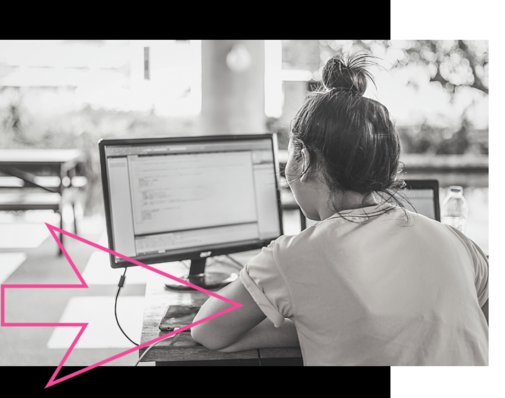 Women coding at computer